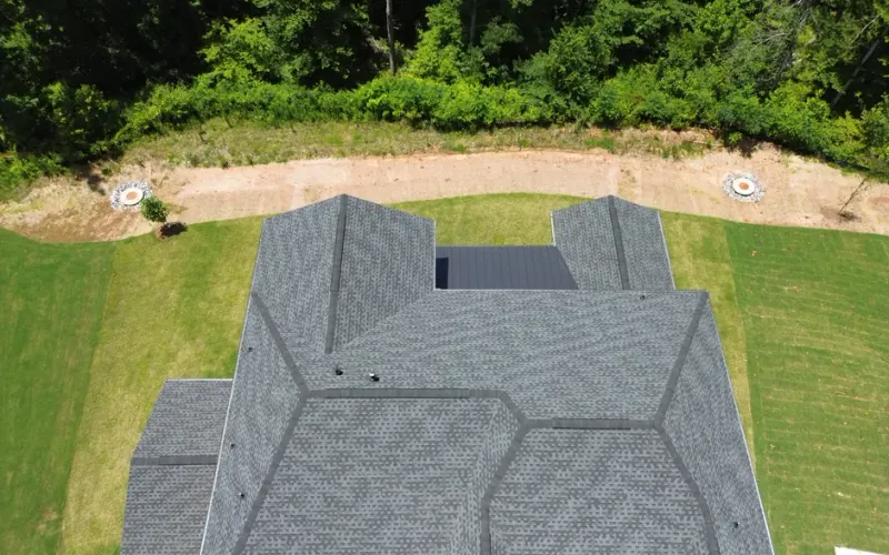 Best Roswell Roofer team performing a free roof inspection on a residential home in Roswell, GA